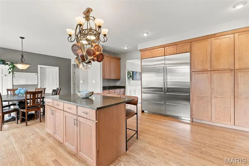 Built-in 66" Sub-Zero refrigeration and sizable pantry space — 1000 Gardenbridge Place, St Charles, MO 63303