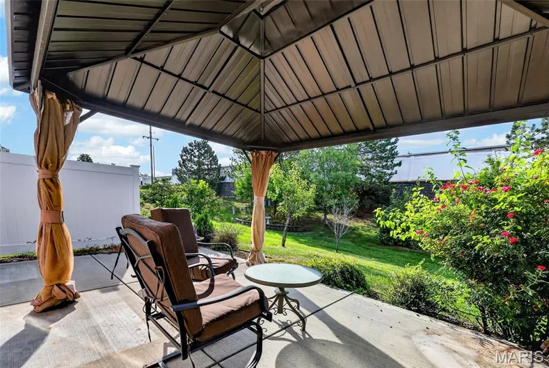Back patio with privacy fence & pergola — 114 Savannah Terrace, Wentzville, MO 63385