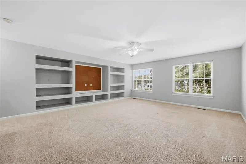 Spacious Bonus Room with Built in Wall Shelving — 223 Chestnut Hill Drive, O'Fallon, MO 63368