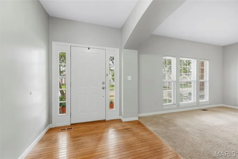 Entrance Foyer with 9 Foot Ceilings and Wood Flooring — 223 Chestnut Hill Drive, O'Fallon, MO 63368