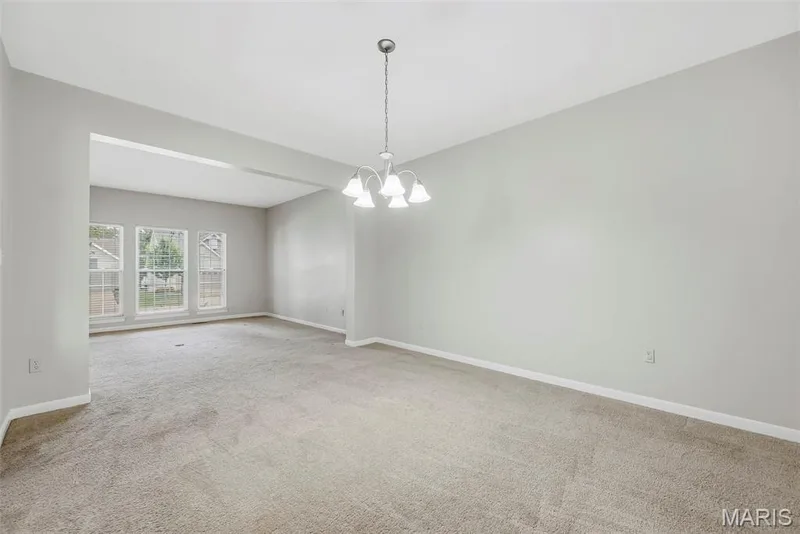Dining Room and Living Room — 223 Chestnut Hill Drive, O'Fallon, MO 63368