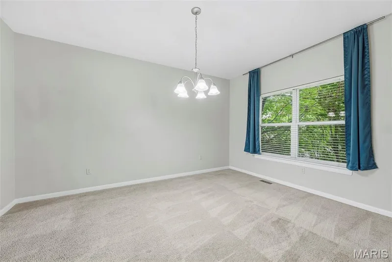 Dining Room with 9 Foot Ceilings — 223 Chestnut Hill Drive, O'Fallon, MO 63368
