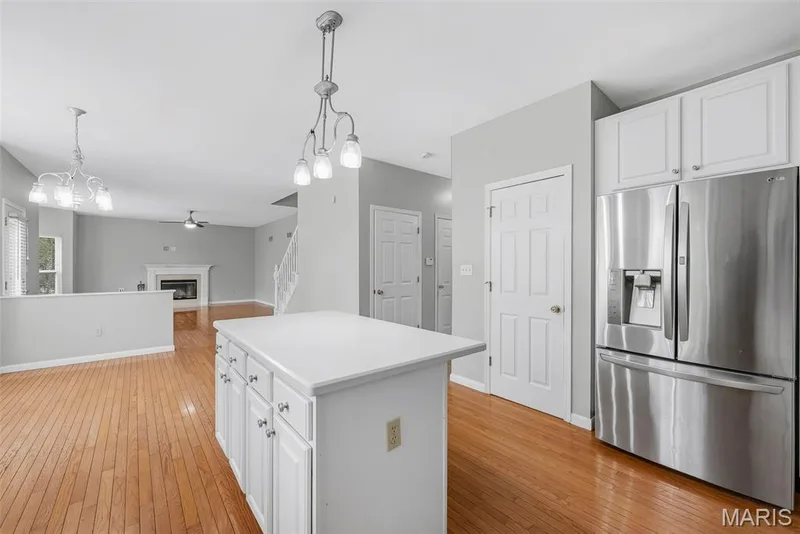Island with Seating Bar and Walk in Pantry in Kitchen — 223 Chestnut Hill Drive, O'Fallon, MO 63368