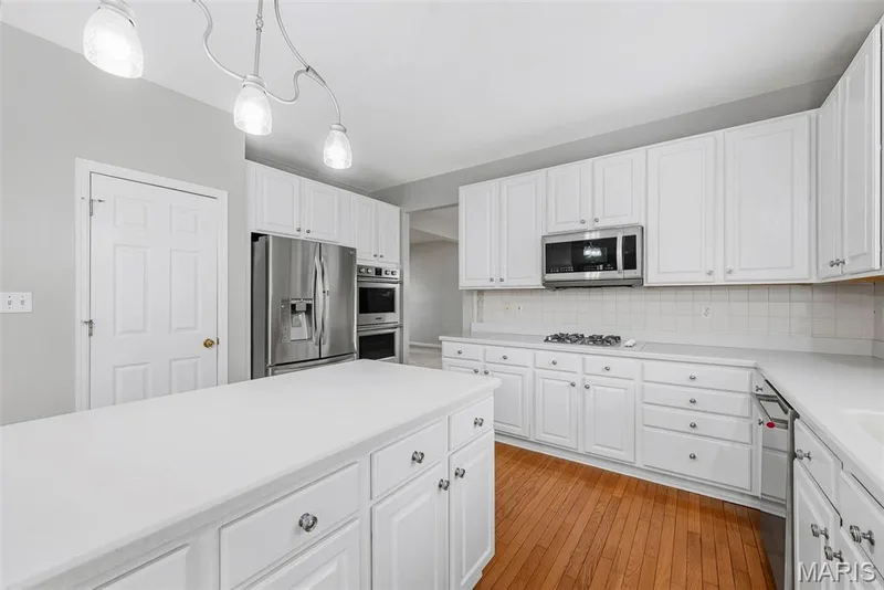 Double Wall Oven, Refrigerator, Gas Cooktop and Above the Range Microwave — 223 Chestnut Hill Drive, O'Fallon, MO 63368
