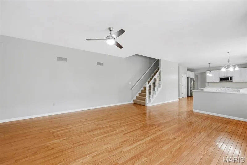 Family Room with 9 Foot Ceilings and Wood Flooring — 223 Chestnut Hill Drive, O'Fallon, MO 63368