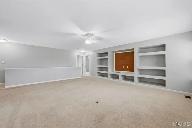 Spacious Bonus Room with Built in Shelving — 223 Chestnut Hill Drive, O'Fallon, MO 63368