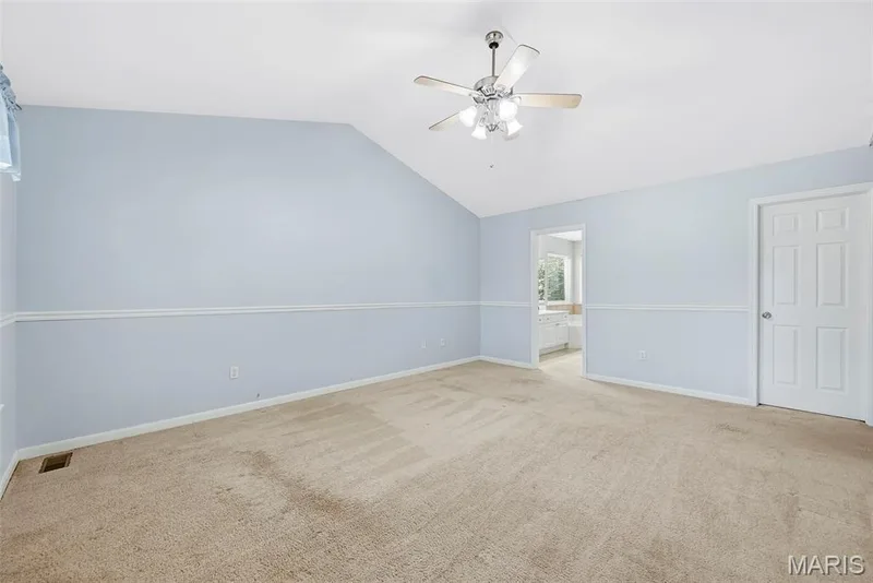 Primary Bedroom Suite with Vaulted Ceilings and Walk in Closet — 223 Chestnut Hill Drive, O'Fallon, MO 63368