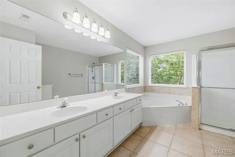 Primary Bath with Double Bowl Vanity, Corner Soaking Tub and Shower — 223 Chestnut Hill Drive, O'Fallon, MO 63368