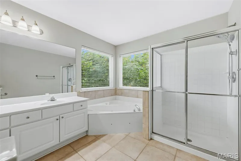 Primary Bath with Double Bowl Vanity, Jetted Soaking Tub and Shower — 223 Chestnut Hill Drive, O'Fallon, MO 63368