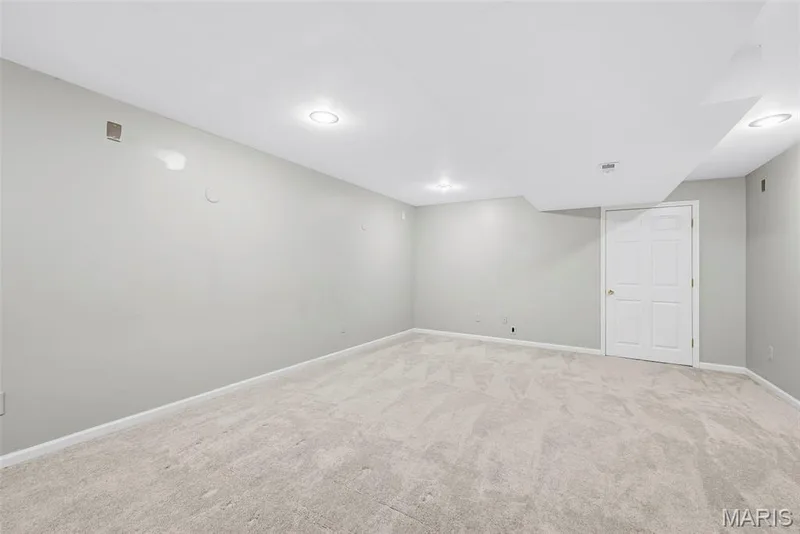Rec Room in Finished Lower Level — 223 Chestnut Hill Drive, O'Fallon, MO 63368