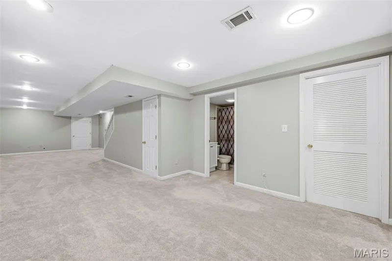 Rec Room in Finished Lower Level — 223 Chestnut Hill Drive, O'Fallon, MO 63368