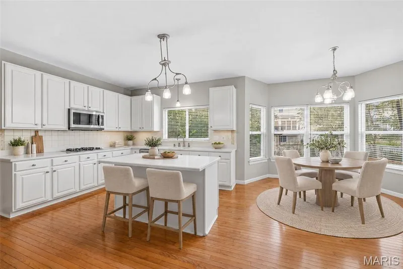 Virtually Staged Photo of the Kitchen and Breakfast Room — 223 Chestnut Hill Drive, O'Fallon, MO 63368