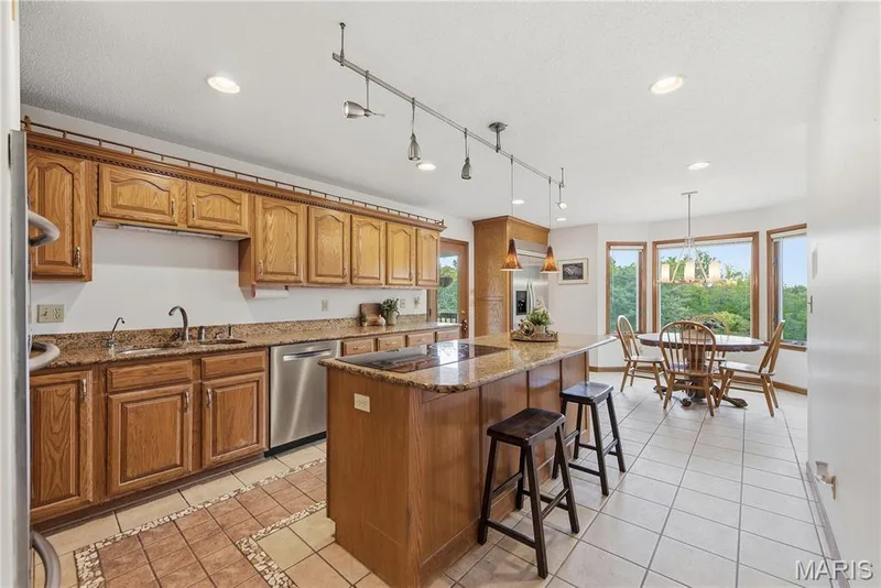 Spacious kitchen with stainless appliances — 1409 Boone Valley Ridge, Augusta, MO 63332