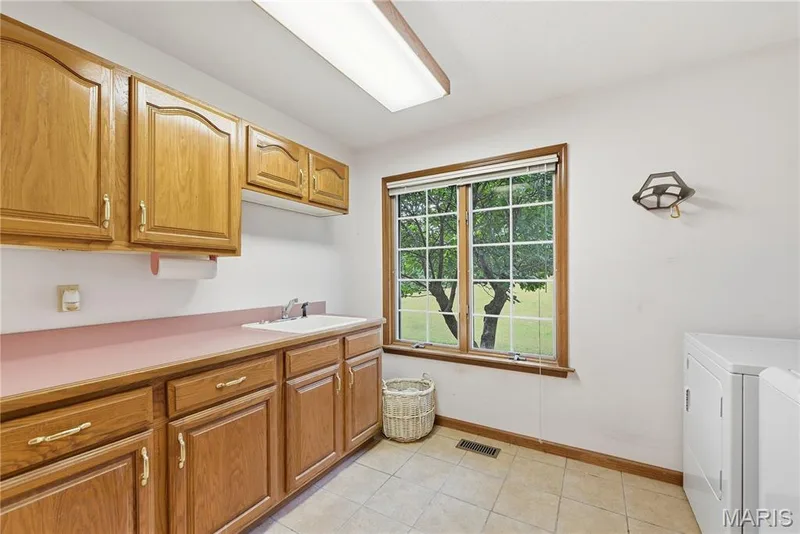 Main floor laundry — 1409 Boone Valley Ridge, Augusta, MO 63332