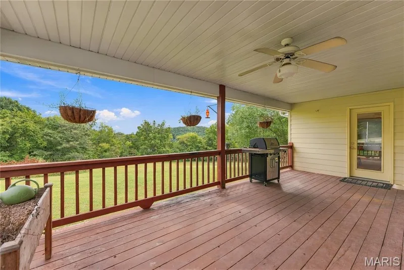 Covered deck with tantalizing views of nature — 1409 Boone Valley Ridge, Augusta, MO 63332