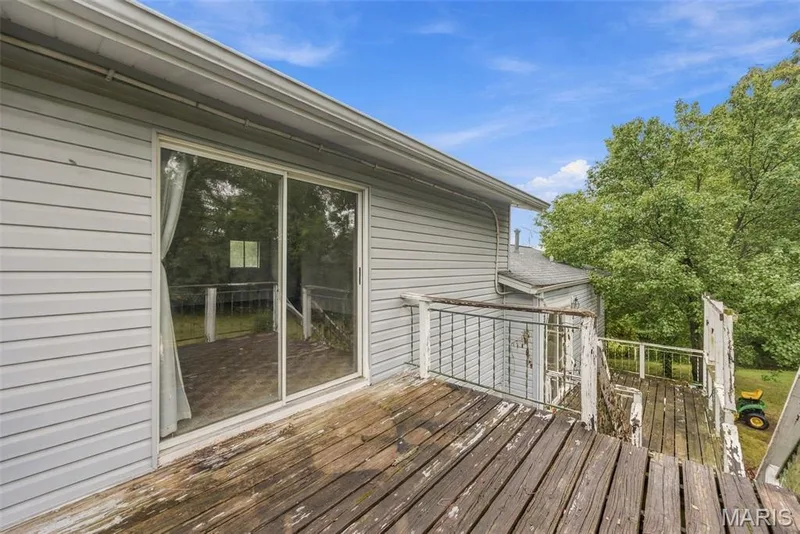 Deck off the room above the garage — 1301 Drummond Court, St Charles, MO 63303