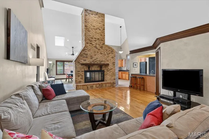Family room showing fireplace — 14418 W Open Meadow Court W, Chesterfield, MO 63017