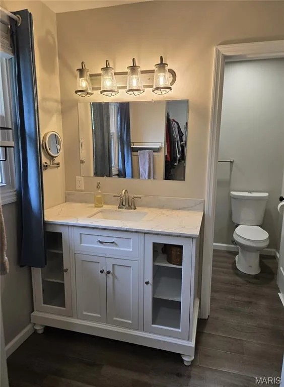Vanity area of primary bathroom.  Large walk-in closet is reflected in the mirror — 266 Savoy Drive, Lake St. Louis, MO 63367
