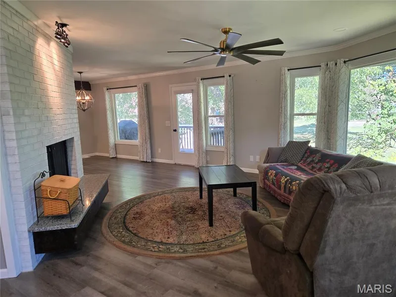 Living Room with LOTS of windows to bring in natural light! — 266 Savoy Drive, Lake St. Louis, MO 63367