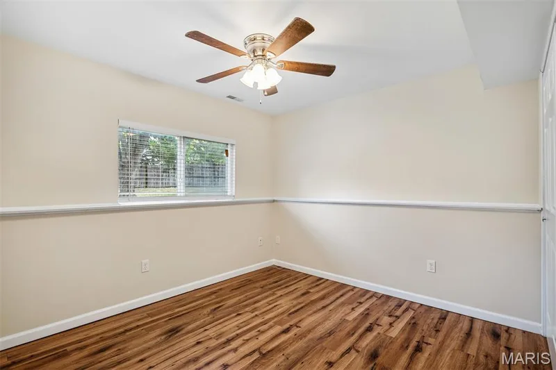 guest quarters in lower level without AI generated image — 223 Destiny Court, Wentzville, MO 63385