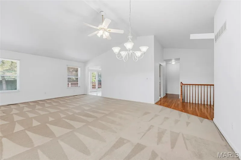 Open Living and Dining areas with vaulted ceiling. — 199 Southern Oaks Drive, St Charles, MO 63303
