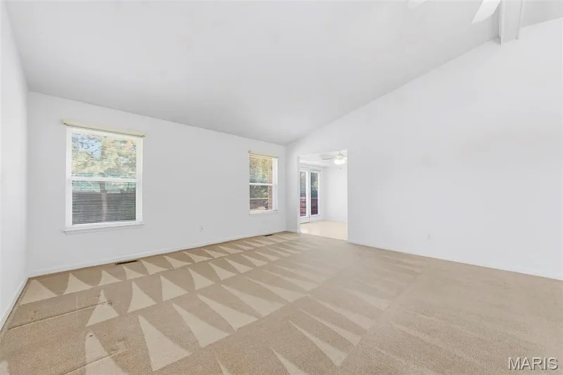 Vaulted living room filled with natural light. — 199 Southern Oaks Drive, St Charles, MO 63303