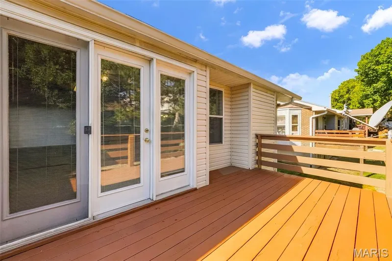 Deck is conveniently accessed from the breakfast area. — 199 Southern Oaks Drive, St Charles, MO 63303