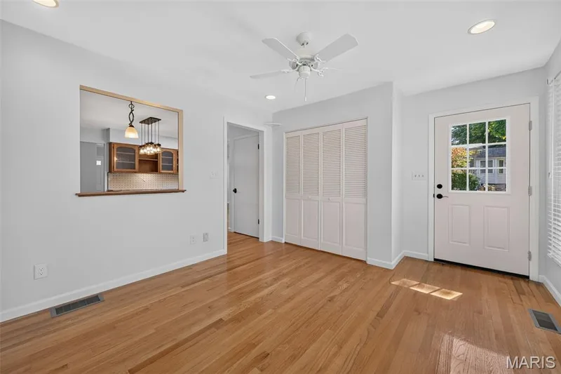 Main-floor laundry is conveniently tucked behind doors, with easy access to the kitchen and backyard. — 2913 Cypress Drive, St Charles, MO 63301