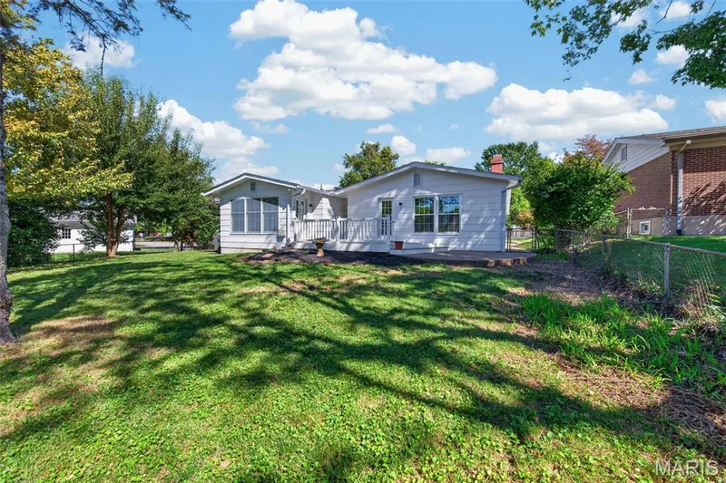A generous backyard provides plenty of room to enjoy the outdoors. — 2913 Cypress Drive, St Charles, MO 63301