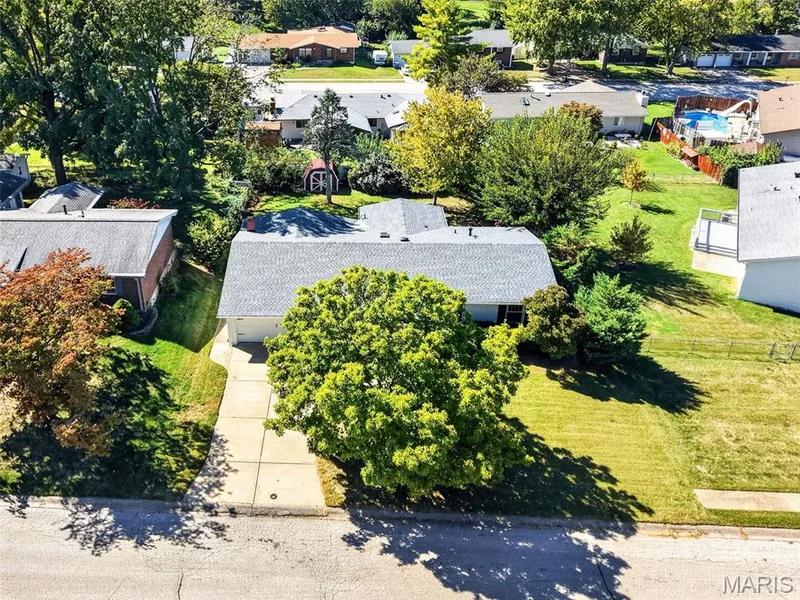 Aerial view provides a final look at the home, lot and surrounding Duchesne Hills neighborhood. — 2913 Cypress Drive, St Charles, MO 63301