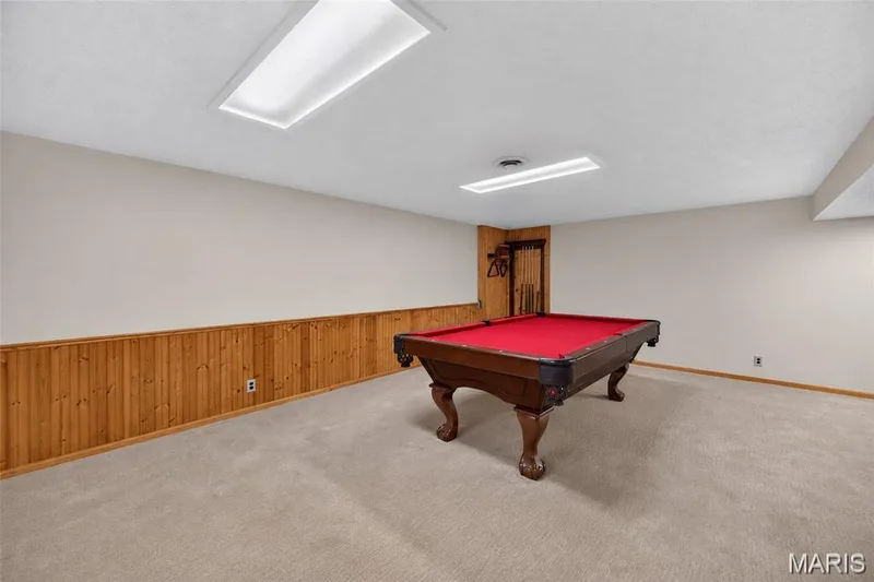 Lower-level recreation space with pool table and room for entertaining. — 2913 Cypress Drive, St Charles, MO 63301