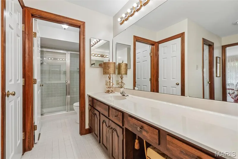 Separate shower and double sink vanity with tons of counter space. — 2260 Ridgley Woods Drive, Chesterfield, MO 63005