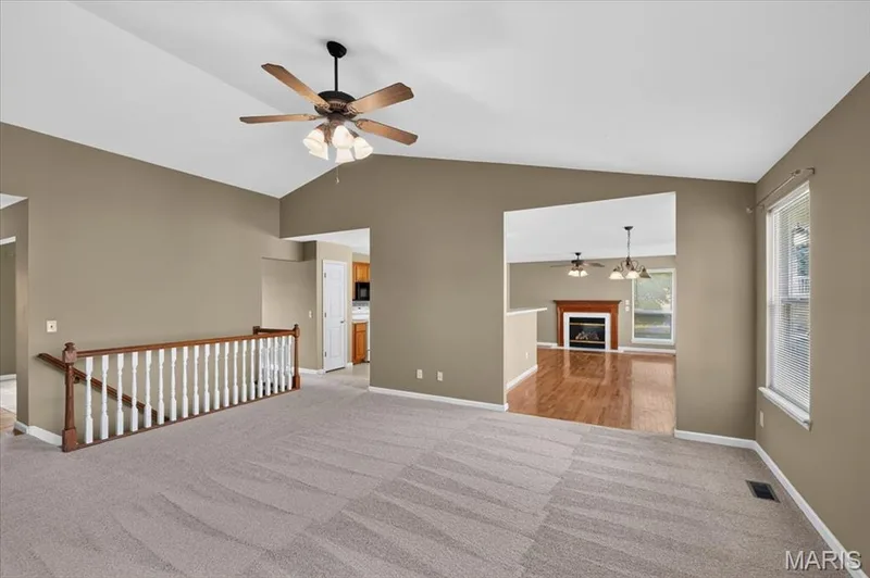 Great room also opens to the kitchen and dining area — 11 Swift Creek Court, St Peters, MO 63376