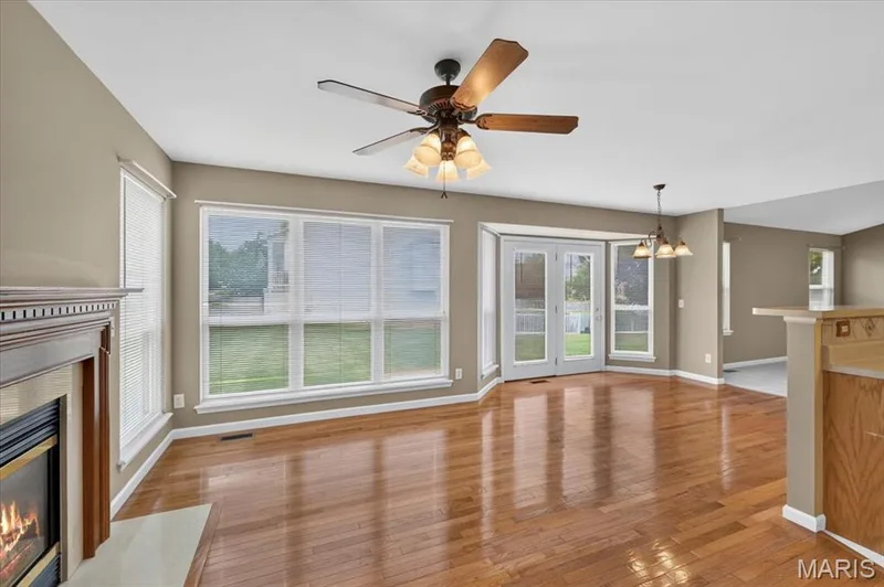 Doors open to the level back yard. — 11 Swift Creek Court, St Peters, MO 63376