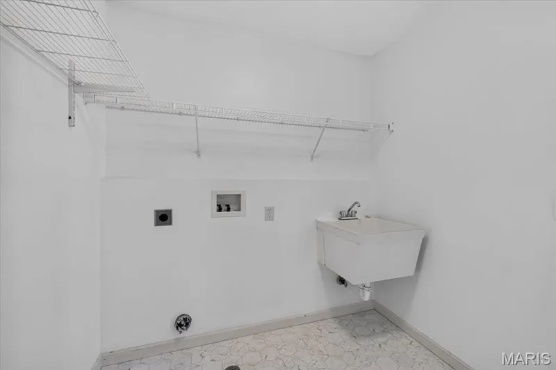 Laundry room has utility sink! — 11 Swift Creek Court, St Peters, MO 63376
