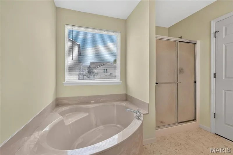 Soaking tub with great natural lighting. — 11 Swift Creek Court, St Peters, MO 63376