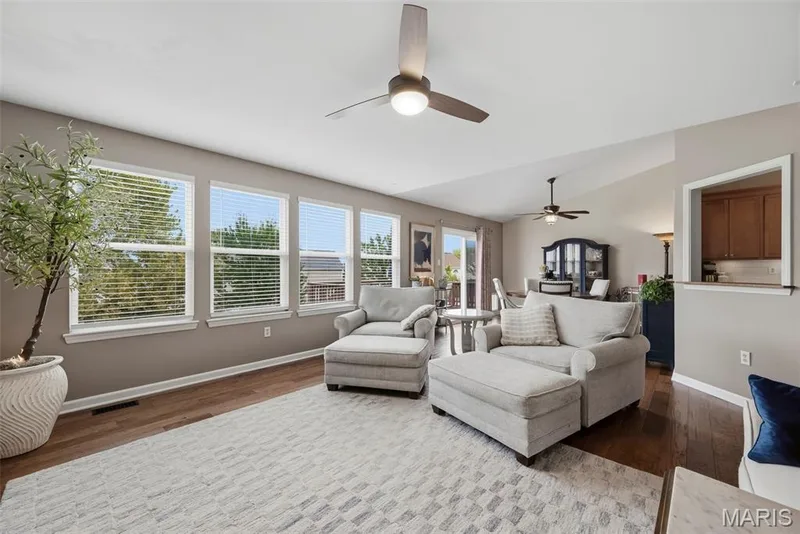 Great room open to dining area — 11 Lambeth Lane, Dardenne Prairie, MO 63368