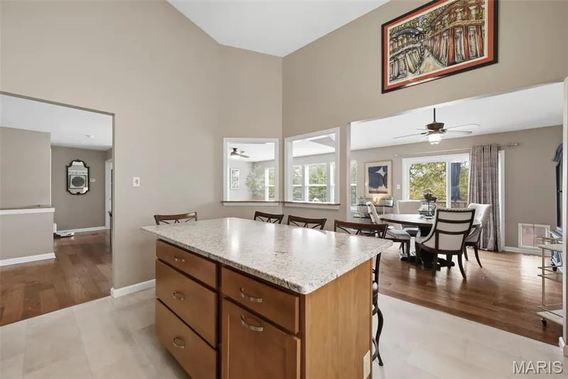 Kitchen opens to dining area — 11 Lambeth Lane, Dardenne Prairie, MO 63368