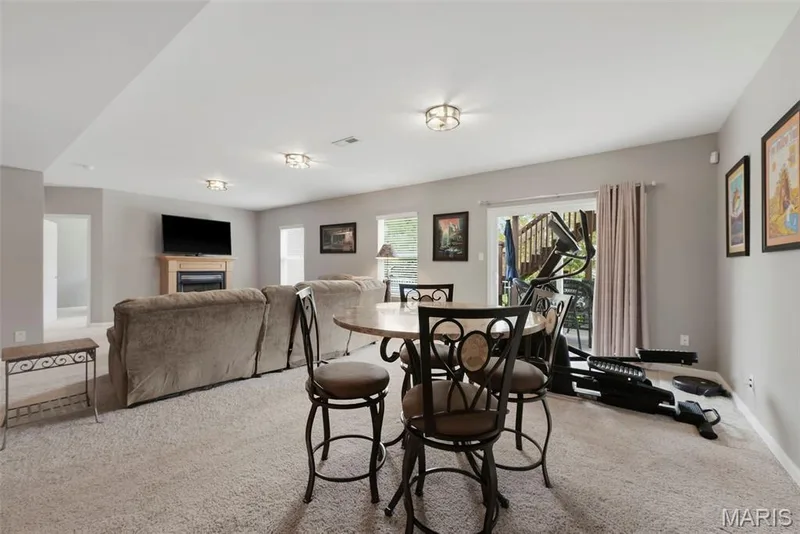 L.L. Family room walk out to covered patio — 11 Lambeth Lane, Dardenne Prairie, MO 63368