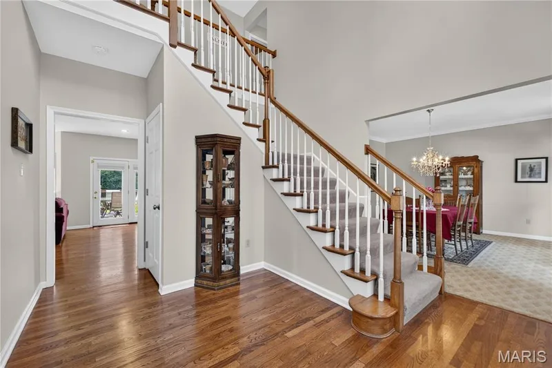 Entry foyer features hardwood flooring that extends through to family room. — 947 Crown Pointe Estates Drive, Wildwood, MO 63021