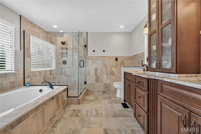 Stunning tile work in this luxury bath. — 947 Crown Pointe Estates Drive, Wildwood, MO 63021