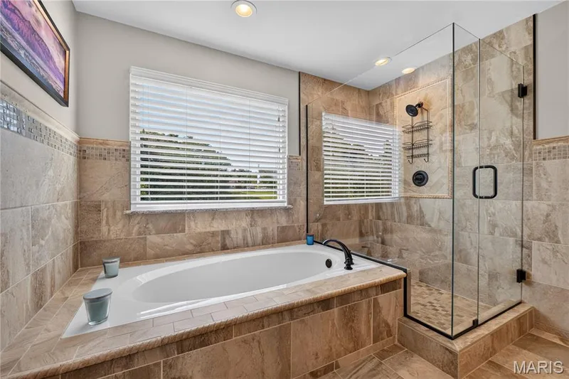 Glass enclosed shower and soaking tub. — 947 Crown Pointe Estates Drive, Wildwood, MO 63021