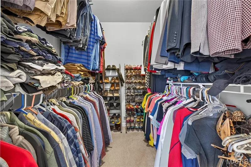 Primary bedroom walk-in closet — 947 Crown Pointe Estates Drive, Wildwood, MO 63021