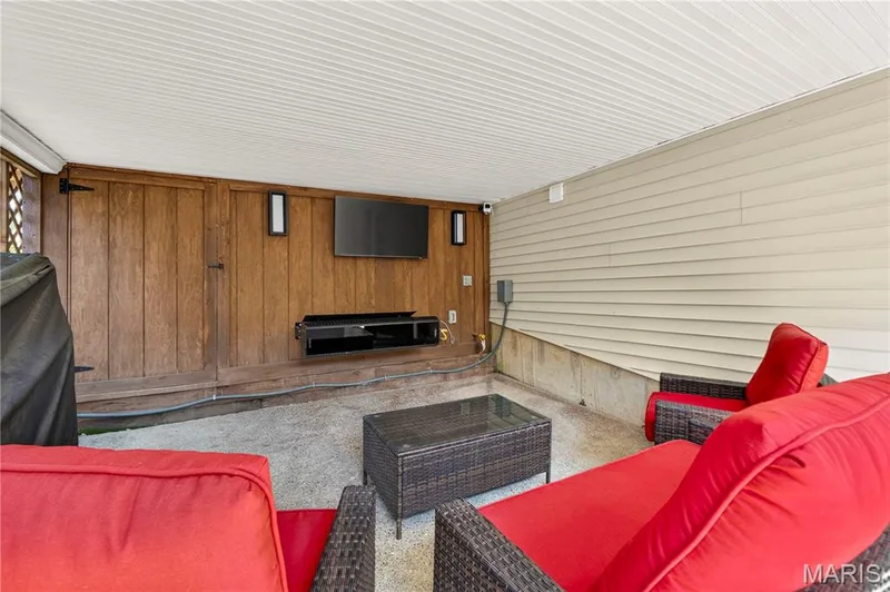 Covered patio under deck, has access to under deck storage area. — 947 Crown Pointe Estates Drive, Wildwood, MO 63021