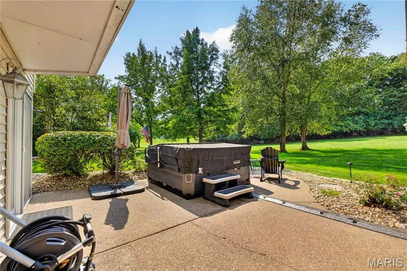 Lower level patio has hot-tub. — 947 Crown Pointe Estates Drive, Wildwood, MO 63021