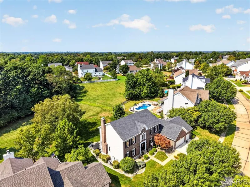 Drone view overlooking front and common ground. — 947 Crown Pointe Estates Drive, Wildwood, MO 63021