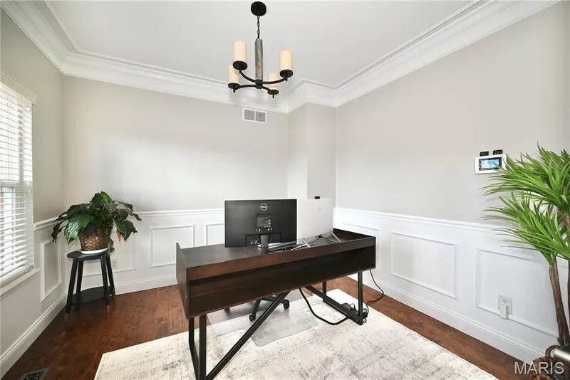 Home office, perfect for work-from-home days. This room can also be used as a formal dining room. — 412 Cottage Grove Drive, Wentzville, MO 63385