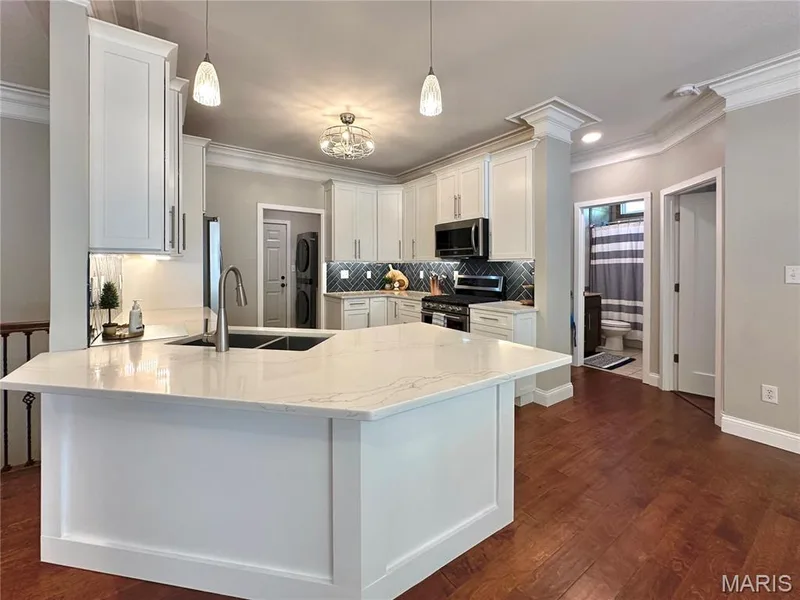 Dream kitchen with endless cabinets & counter space! — 412 Cottage Grove Drive, Wentzville, MO 63385