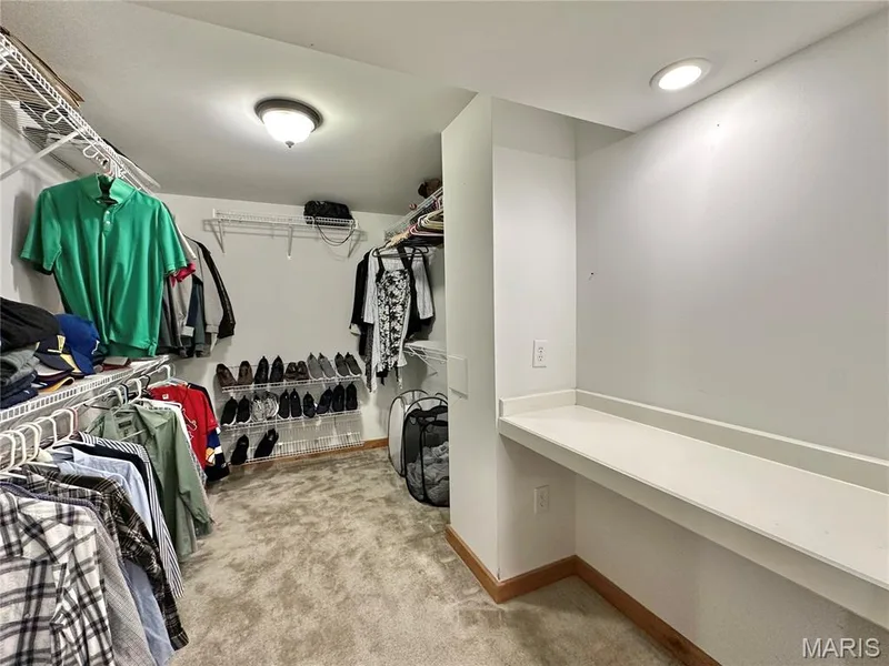 Bedroom 5 walk-in closet with built in desk. — 412 Cottage Grove Drive, Wentzville, MO 63385