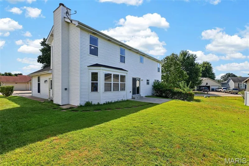 Two-story exterior with white siding — 39 Green Pines Circle, St Peters, MO 63376